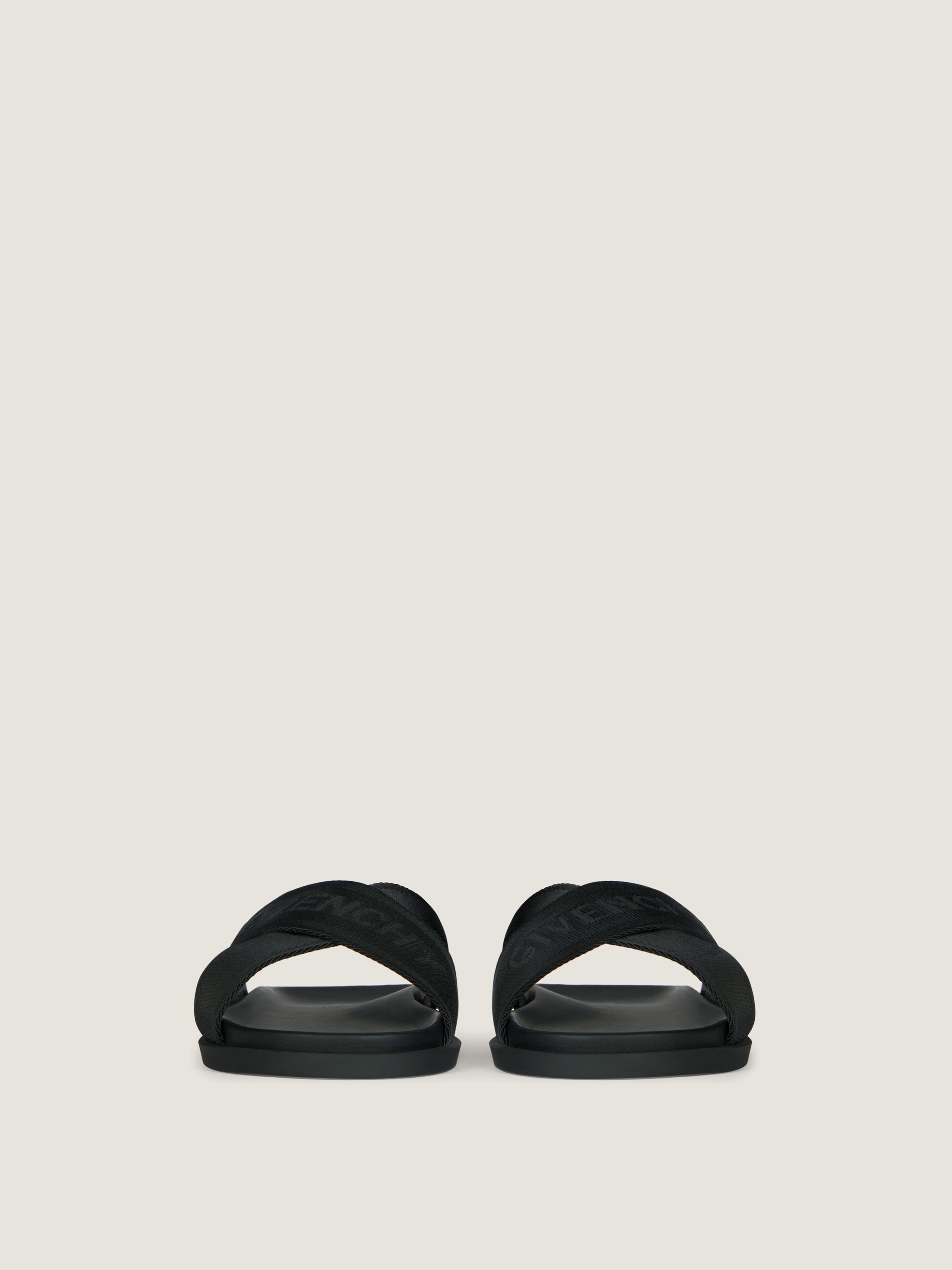 G Plage flat mules with crossed straps in webbing